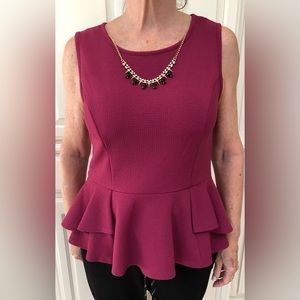 Fuchsia Sleeveless Peplum Top